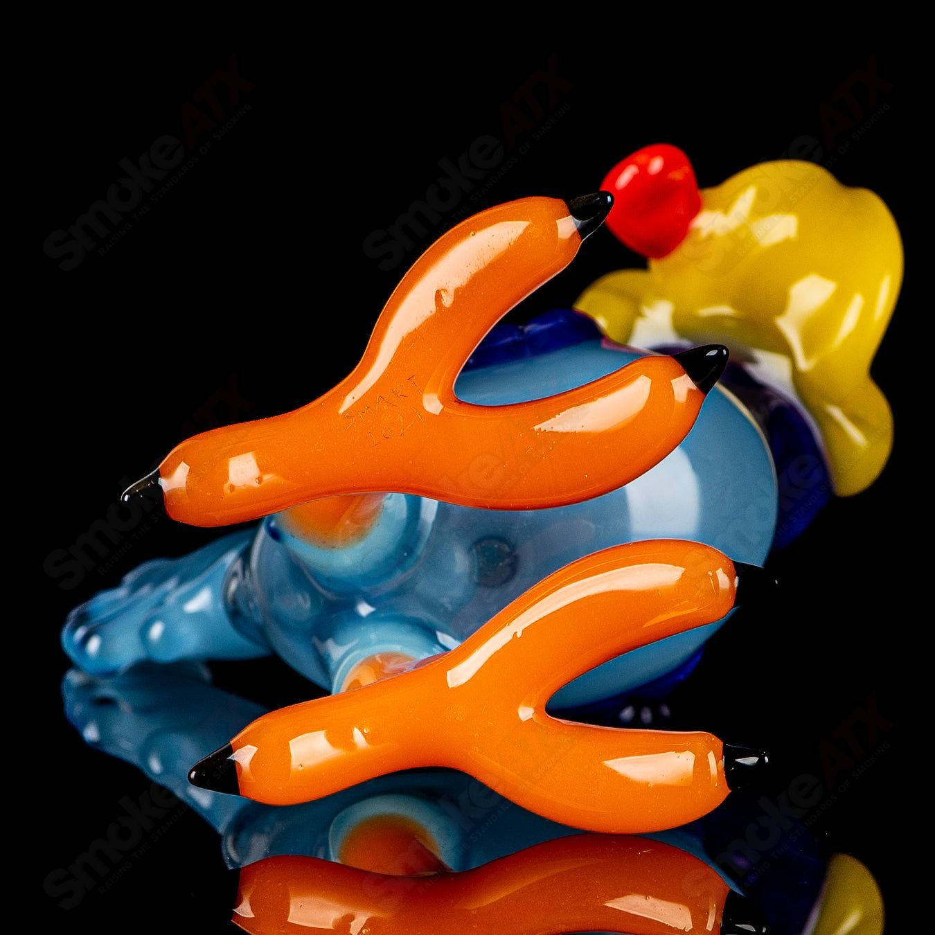 Looney Tunes Roadrunner concentrate rig by J-Smart Glass, clear heady glass with colorful Roadrunner design and intricate details.
