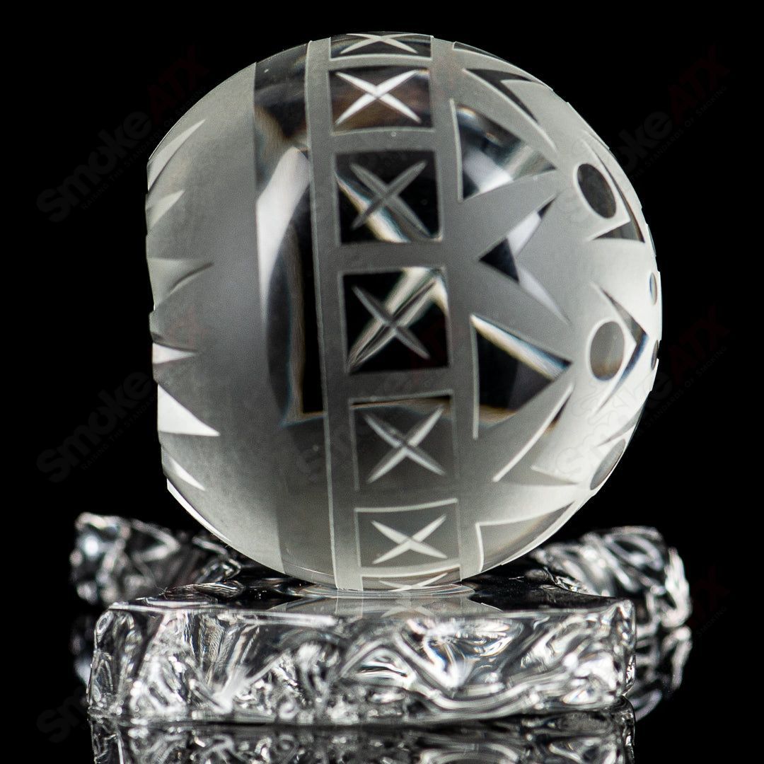 Large faceted snowflake marble by Fatal Facets, a heady glass marble featuring intricate snowflake and faceted design.