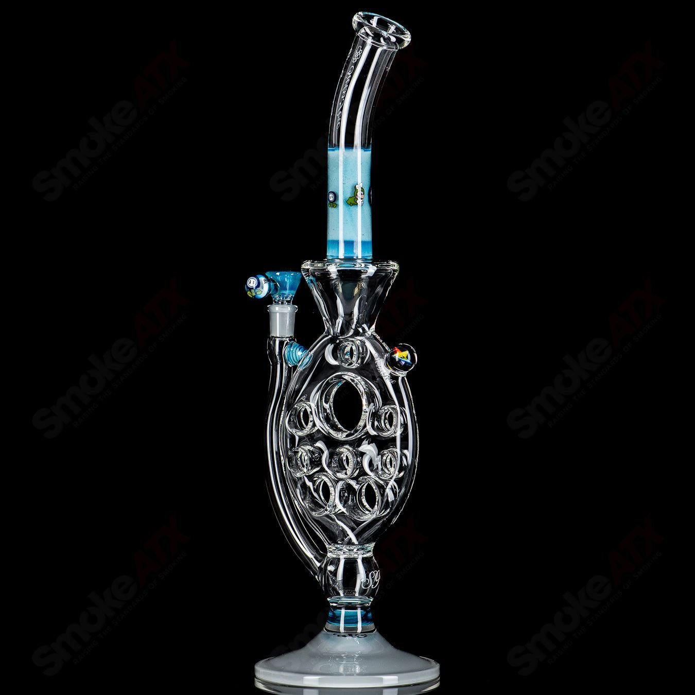 Medium SideFeeder heady glass by Swiss Perc in collaboration with Micro, featuring intricate design and colorful glasswork.