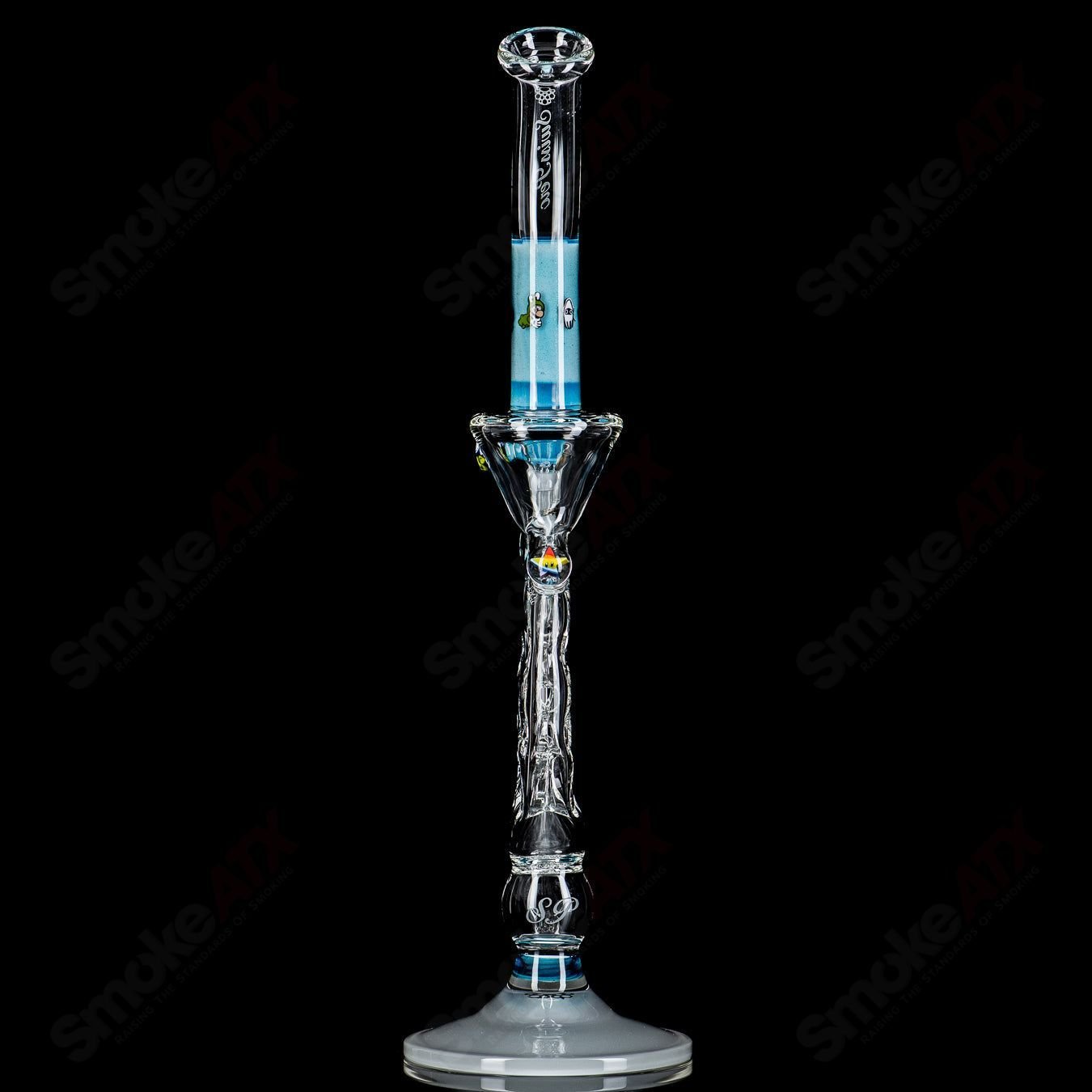 Medium SideFeeder glass pipe by Swiss Perc x Micro, featuring a sleek heady design with intricate glasswork and a side feeder chamber.