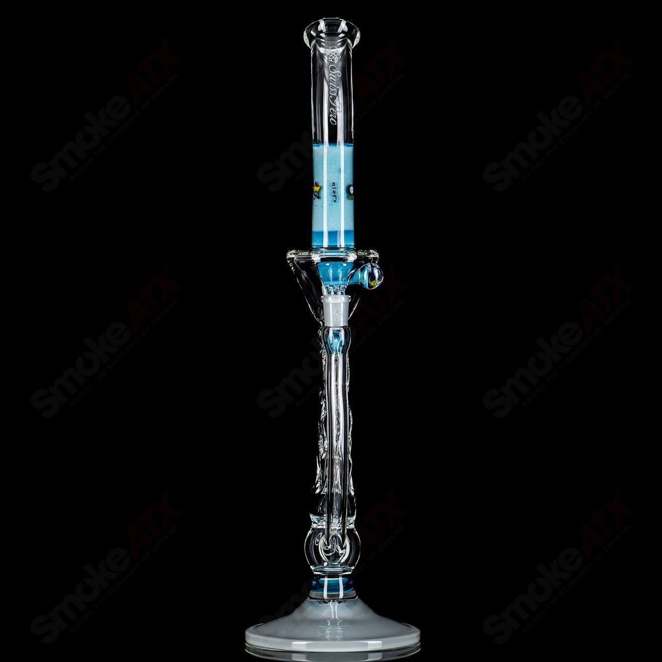 Medium SideFeeder glass piece by Swiss Perc x Micro, featuring intricate heady design and detailed craftsmanship.