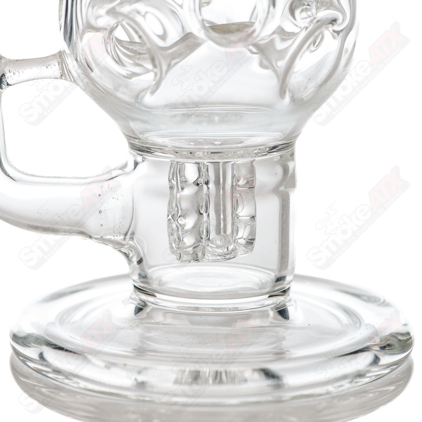 Glass concentrate rig from Dirty Rico featuring a micro Bukkaki design with clear, intricate glasswork for dabbing enthusiasts.