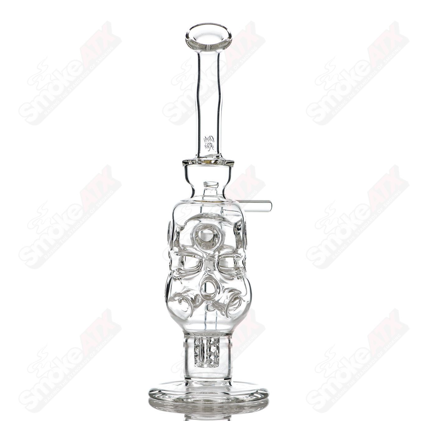 Glass concentrate rig by Dirty Rico, Micro Bukkaki model, featuring a compact design with intricate glasswork and vibrant colors.
