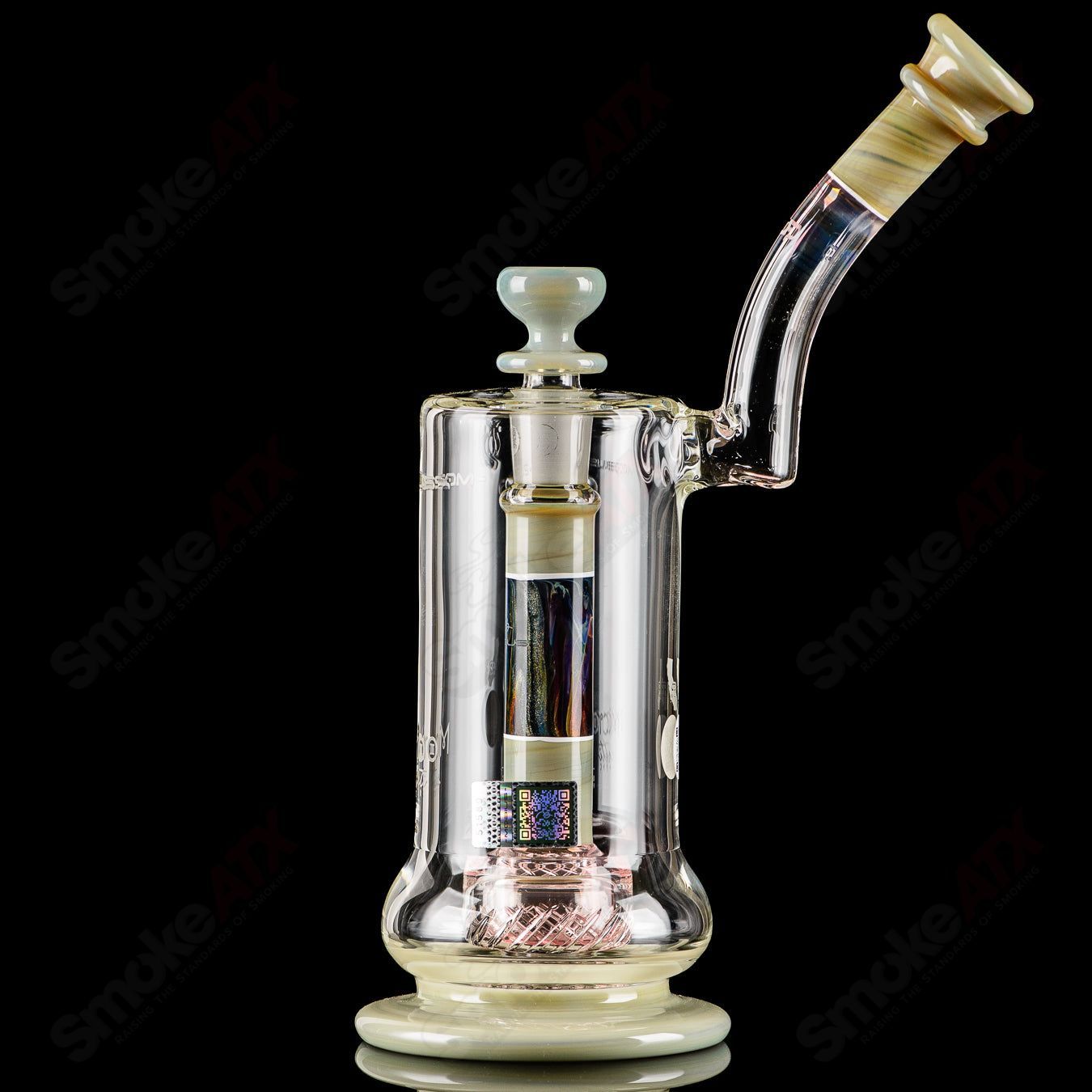 Mobius Micro V3 Reti Accent Series glass bubbler with intricate design and vibrant accents, showcasing a sleek, modern aesthetic.