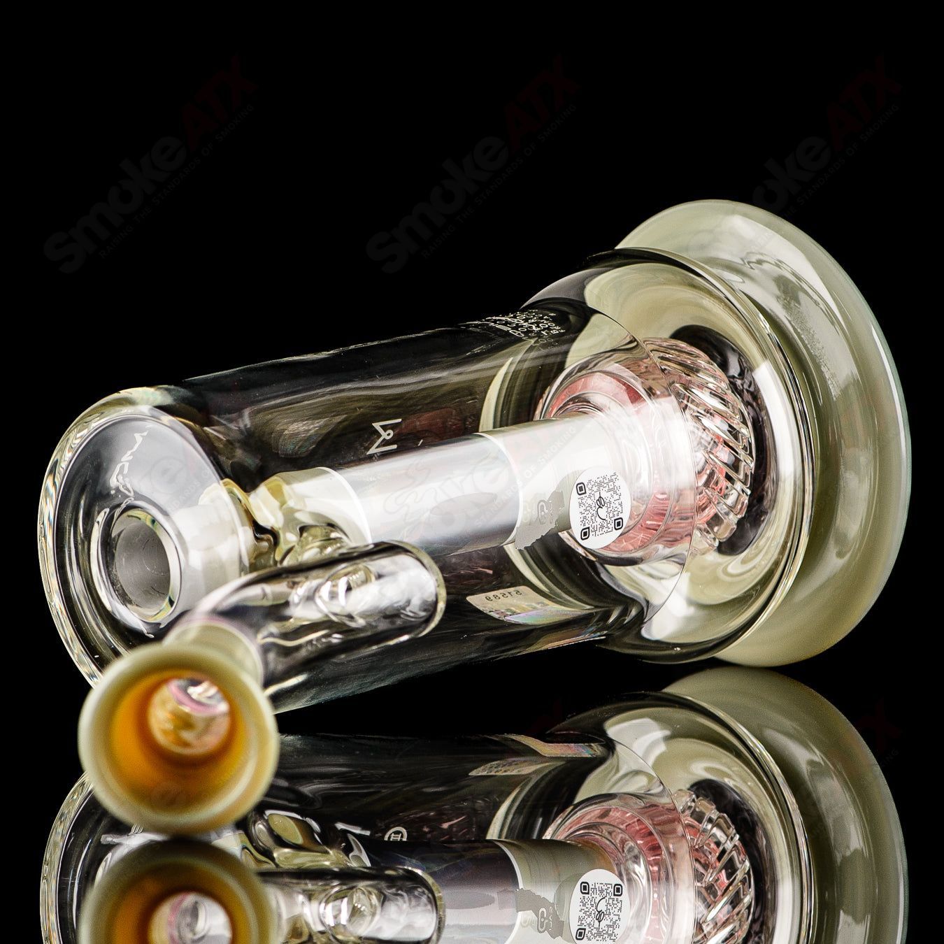 Mobius Micro V3 Reti Accent Series glass bubbler with intricate design, clear glass body, and colorful accents.