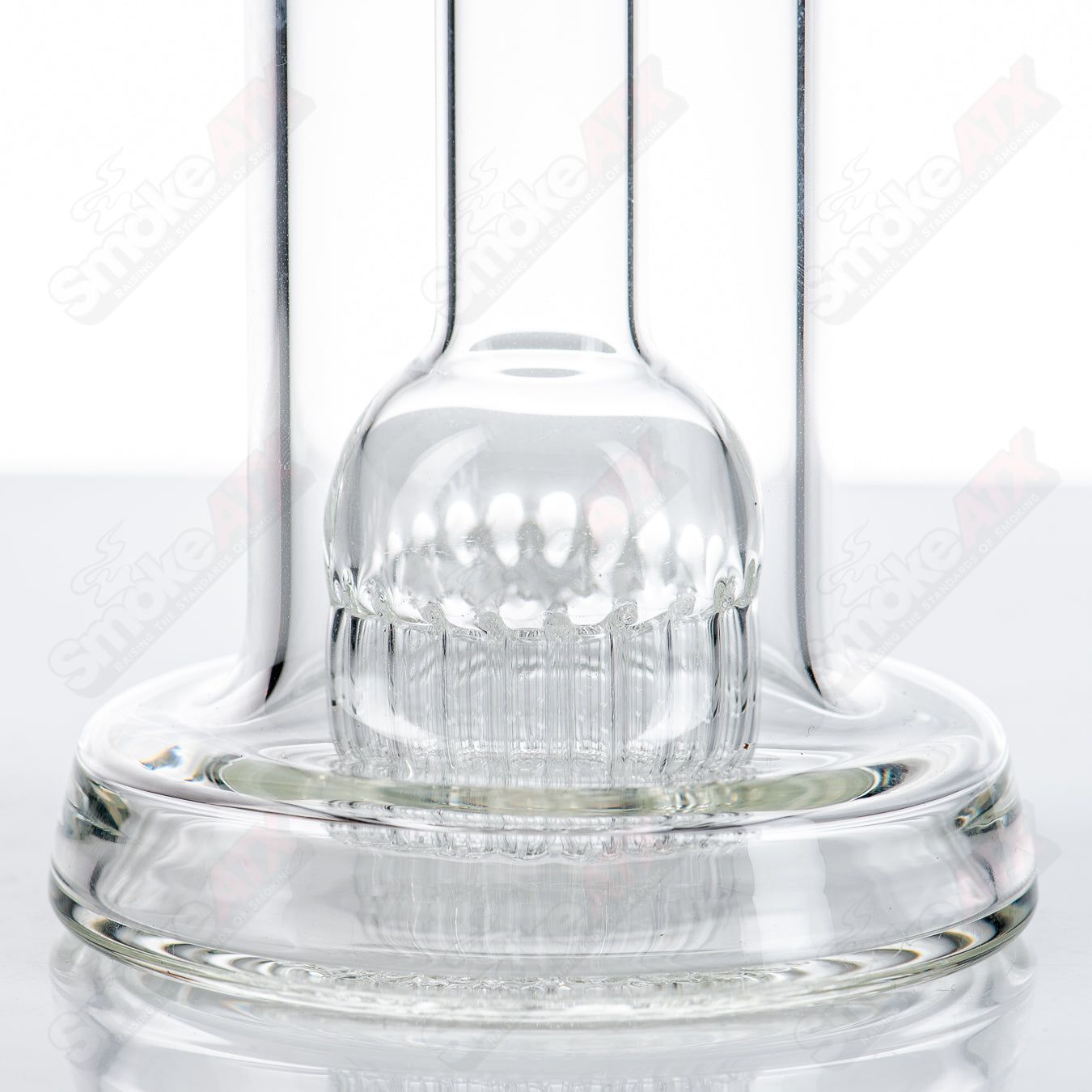 Mini 20 Bubbler Leisure Glass, clear glass bubbler with compact design, featuring a mouthpiece and water chamber for smooth smoking.
