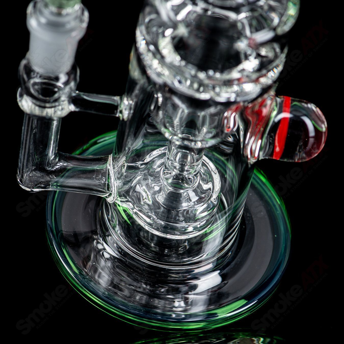 Mini Incycler Heady Glass recycler with green accents by Terroir, featuring a compact design and colorful glass details.