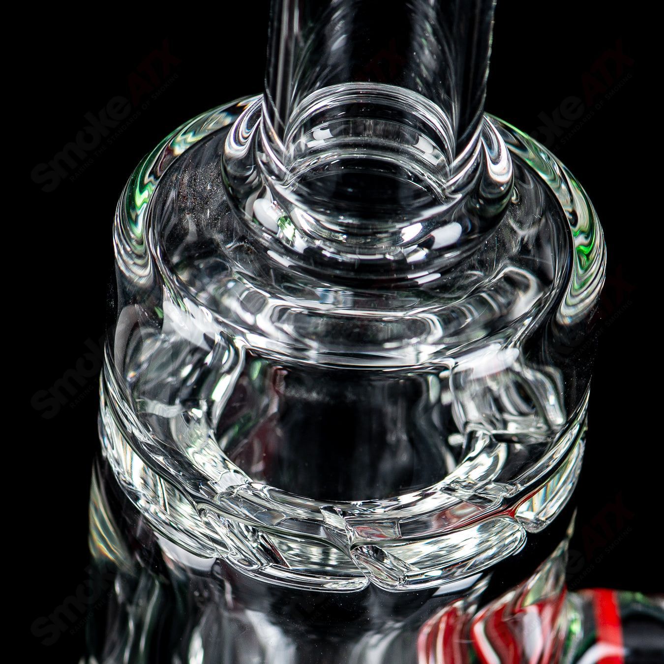 Mini Incycler heady glass recycler with green accents by Terroir, showcasing intricate glasswork and vibrant green details.