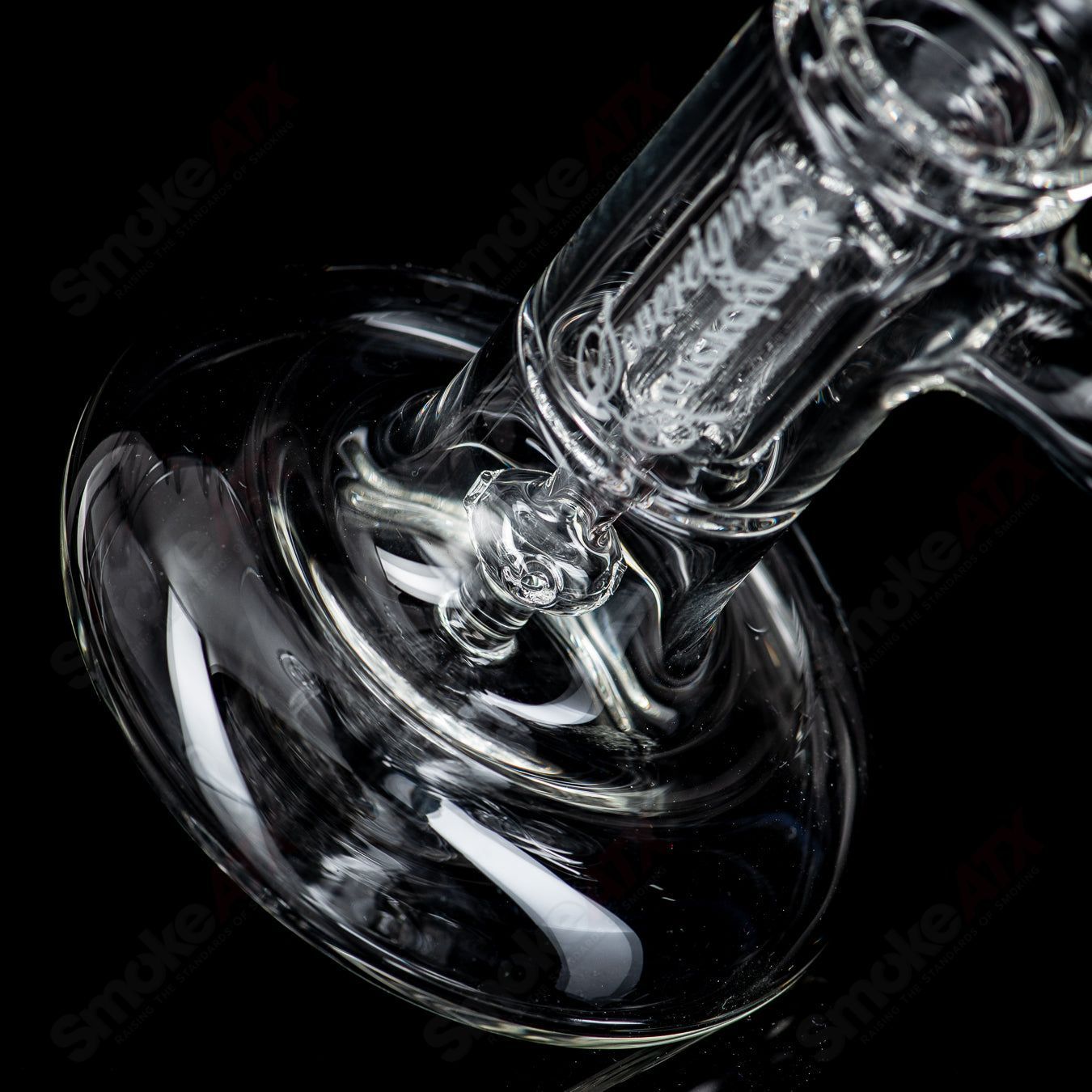Clear mini pillar from Sovereignty Glass featuring a sleek, cylindrical heady glass design with vibrant coloration.