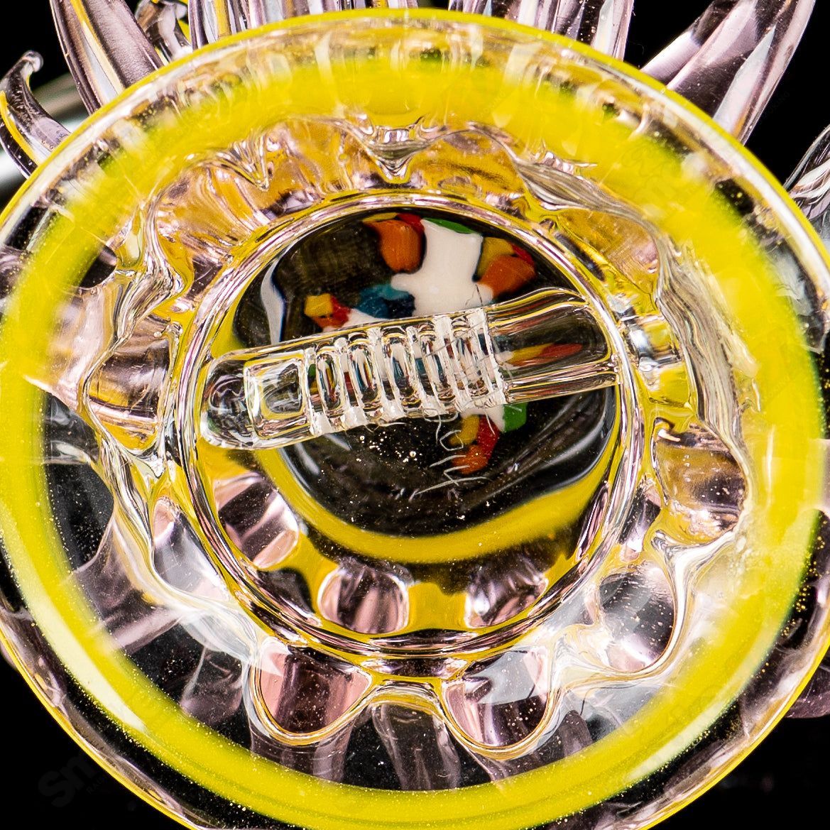 Pink and yellow Mini Rig by Freeek Glass, Heady Glass concentrate rig with colorful design and intricate glass details.