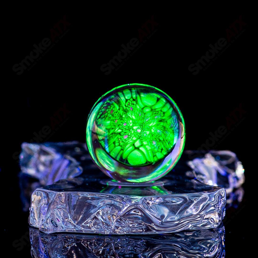 Faceted UV composite marble glass by Indo Glass showing a clear, textured glass with intricate facets and a marble-like design.