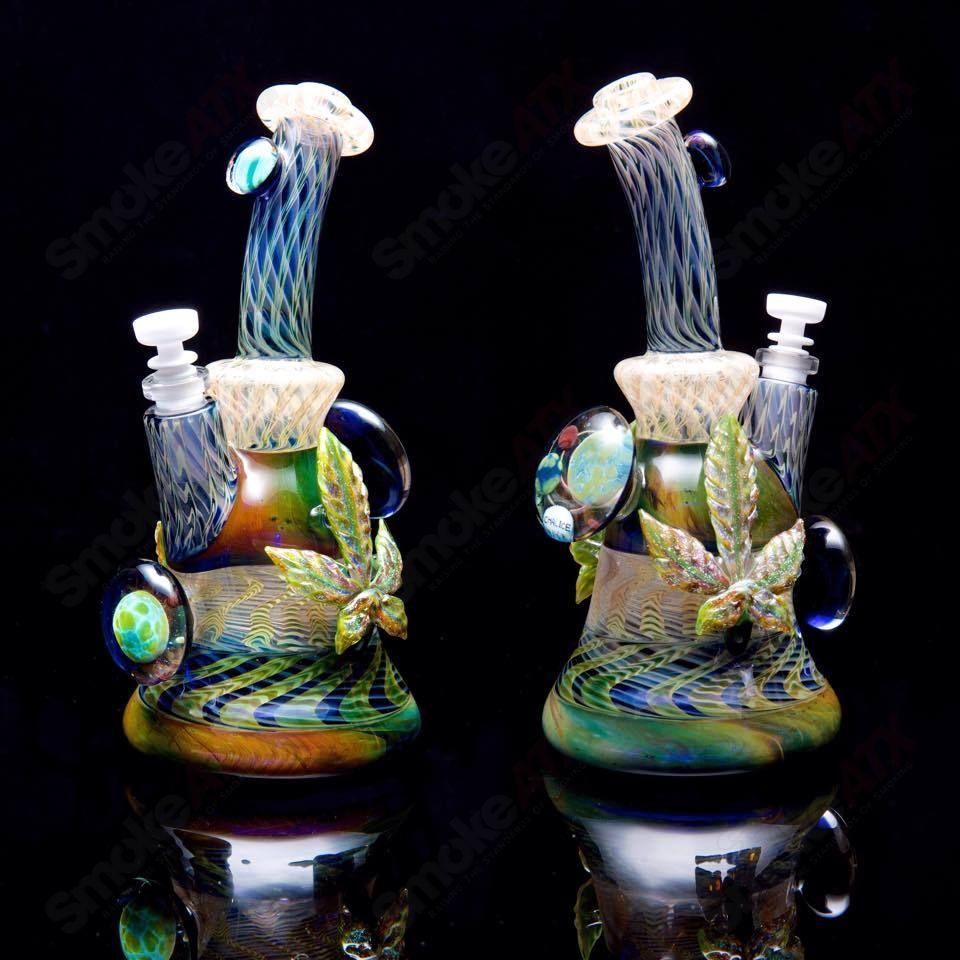 Heady glass concentrate rig from the Mr. Gray x Jolex x JD Maplesden collaboration, featuring intricate design and durable construction.