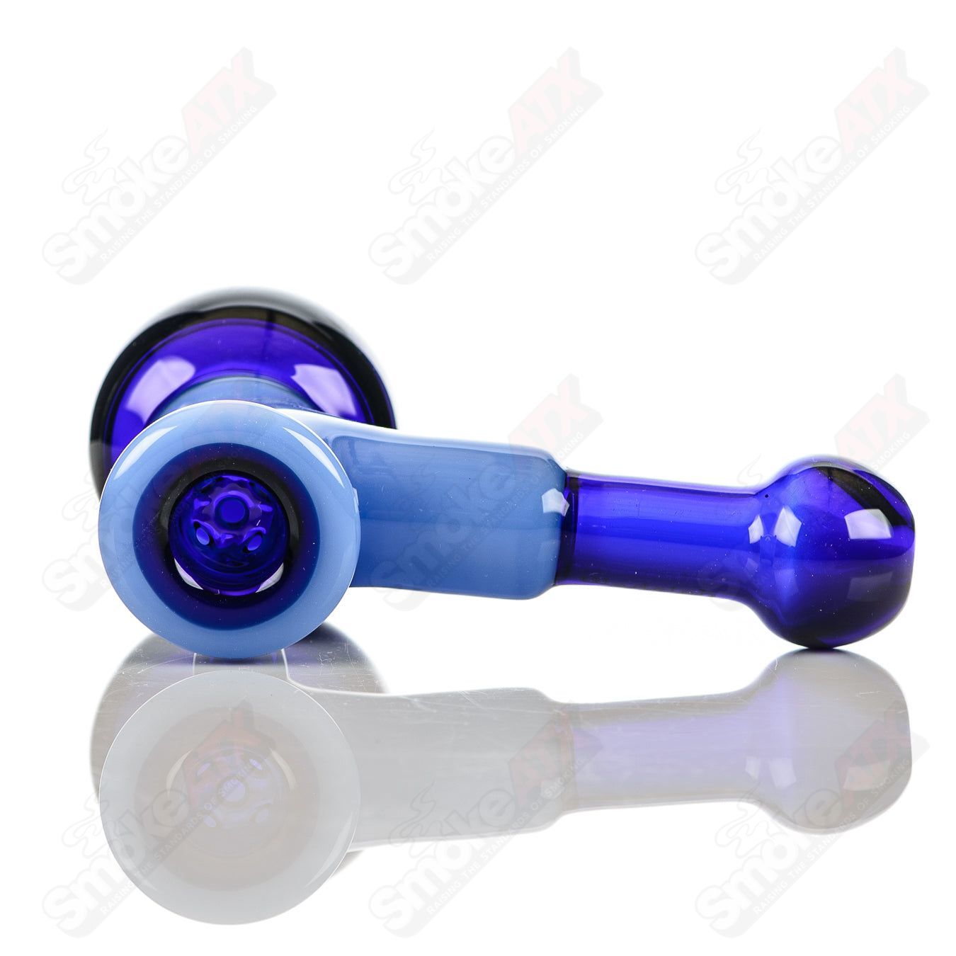 Illadelph multi-hole hammer glass hand pipe in cobalt and milky blue with multiple holes for enhanced airflow.