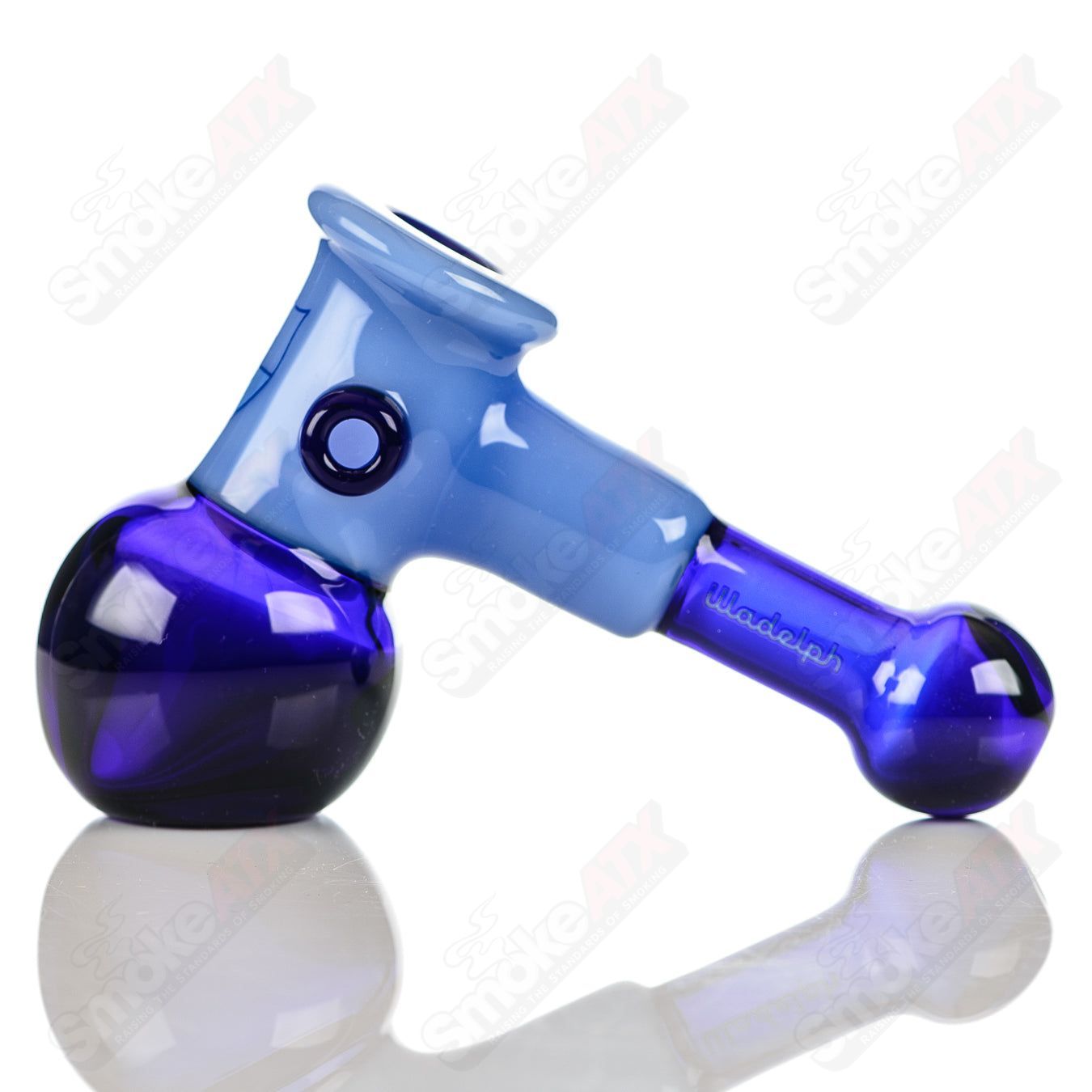 Illadelph cobalt and milky blue multi-hole hammer glass hand pipe with multiple holes for enhanced airflow and cooling.