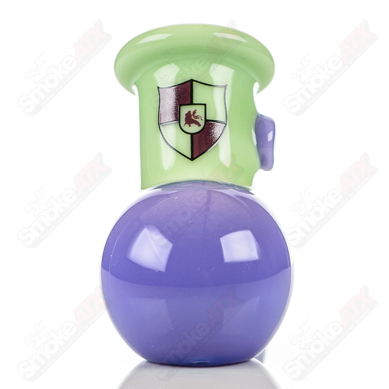 Illadelph multi-hole glass hammer pipe in milky green and pink with multiple holes, designed for smooth smoking experience.