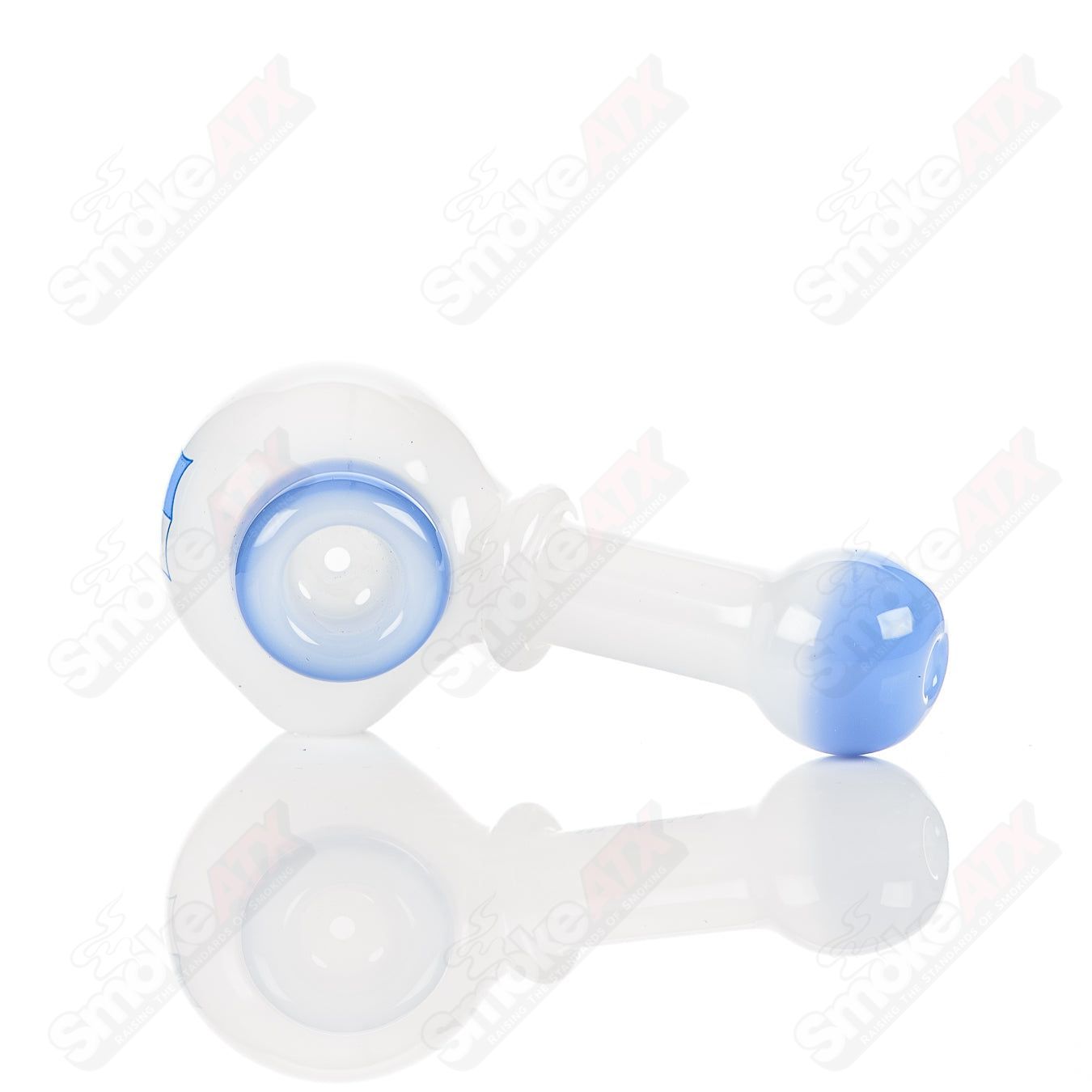 White and blue glass Illadelph multi-hole spoon pipe with multiple airflow holes and a smooth bowl.