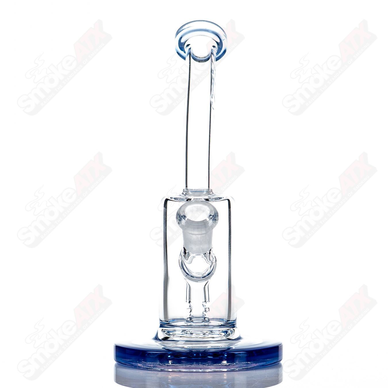 Toro Nano Color Piece with Nano Grail, a colorful glass concentrate rig by Toro, featuring intricate design and vibrant accents.