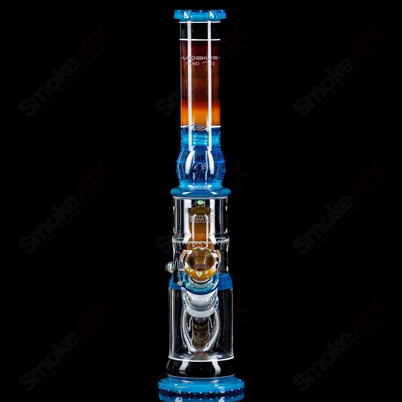 Mobius Nano Matrix V2 Circle Solo glass waterpipe, clear and intricate design, featuring a compact, circular shape for smooth smoking.