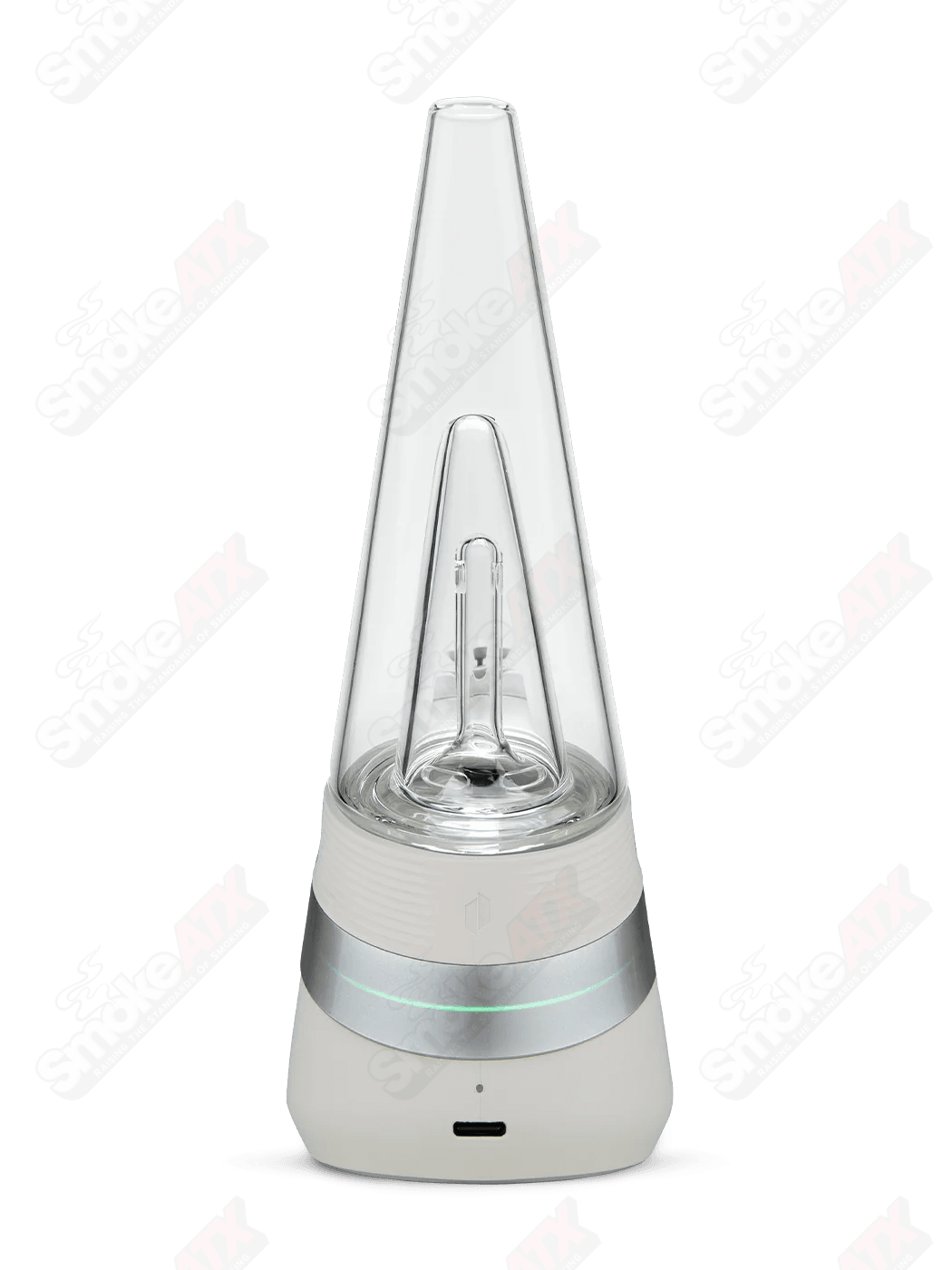 Puffco New Peak Cloud Smart E-Rig with sleek glass design and digital control interface on a modern countertop.