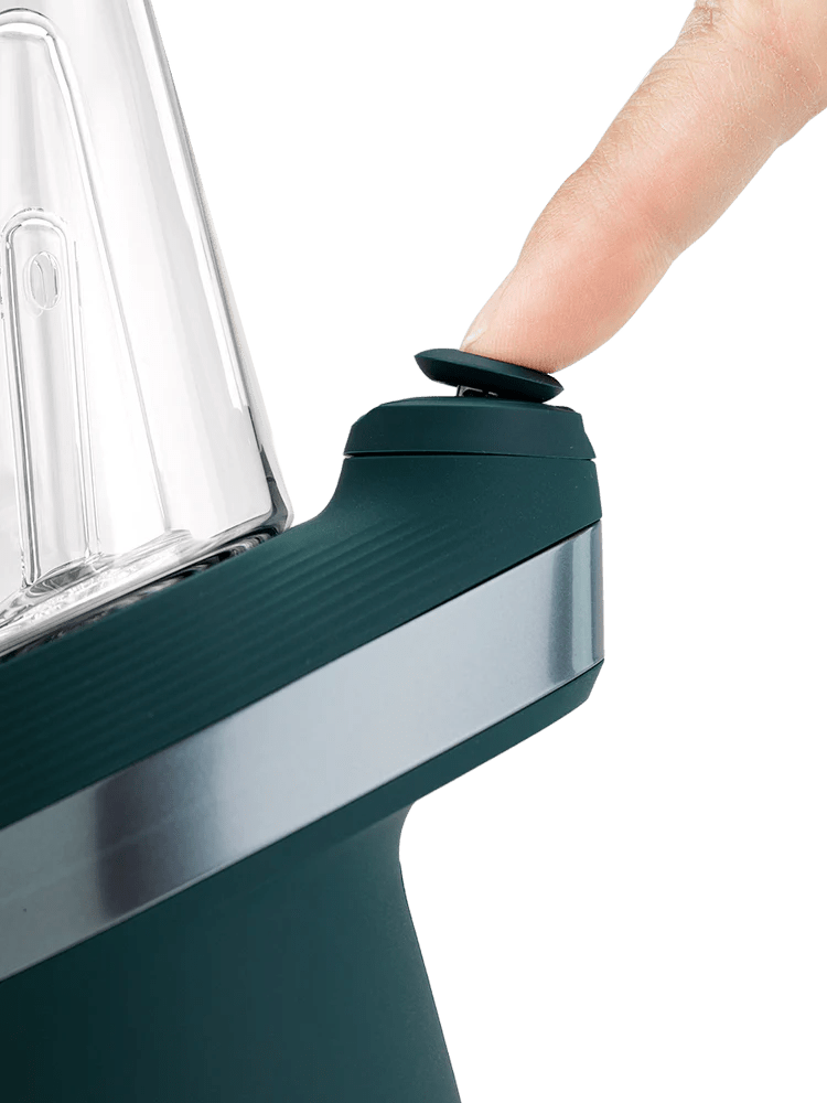 Puffco New Peak Pine Smart E-Rig with sleek design, digital controls, and glass water chamber for aromatic vapor experiences.