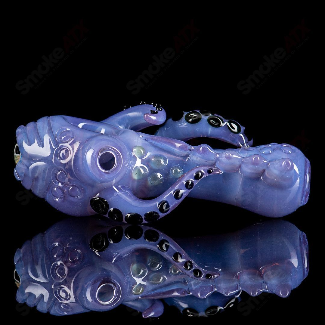 Colorful #3 Seamonster spoon hand pipe by Mako Glass, vibrant heady glass piece with intricate design and smooth glass finish.