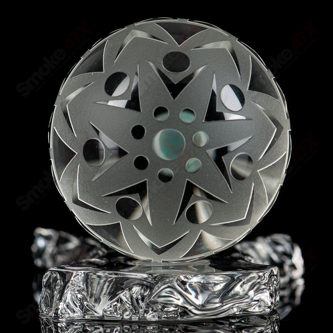 Large faceted snowflake marble by Fatal Facets, heady glass marble with intricate snowflake and faceted design.