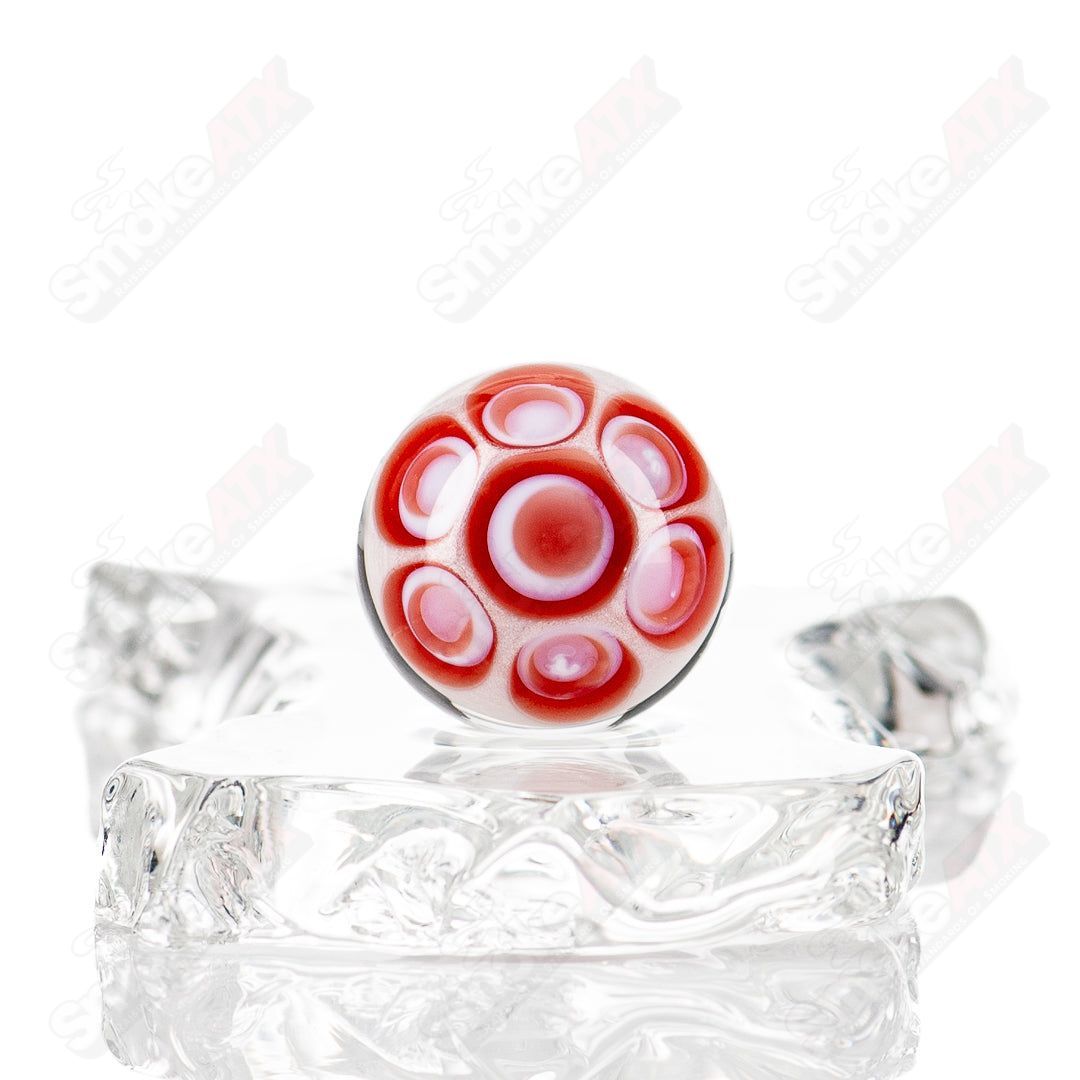 Colorful Devil Bart Mib Indo Glass marble from Indo Glass with intricate swirl patterns and vibrant hues.
