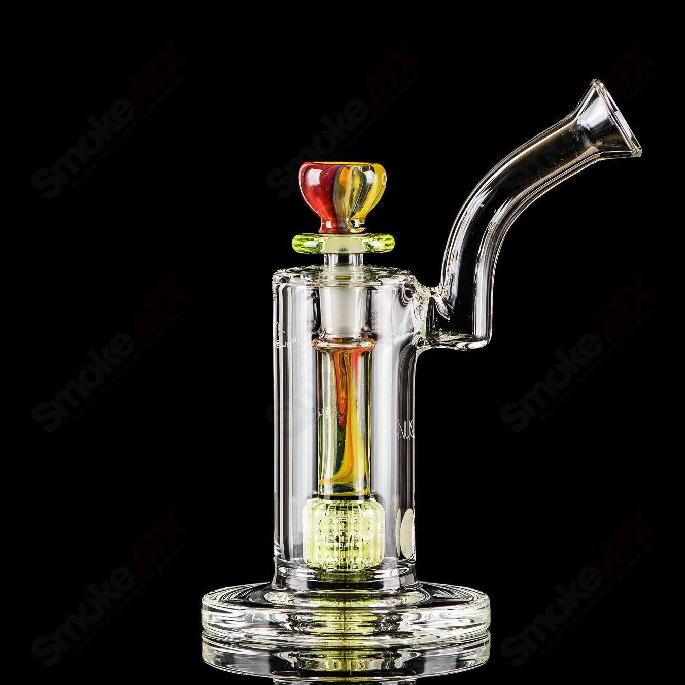 Glass bubbler from Mobius Nuc Accent Series, model 44 of 2023, featuring intricate design and clear glass construction.