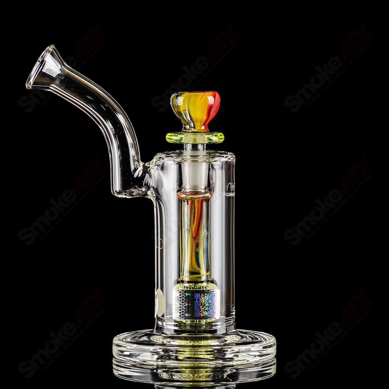 Glass bubbler from Mobius Nuc Accent Series, model 44 of 2023, featuring intricate glass art and a compact, portable design.