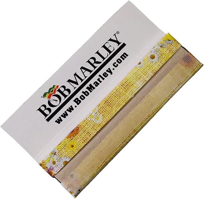 King size organic hemp rolling papers featuring Bob Marley branding, ideal for rolling your favorite herbal blends.