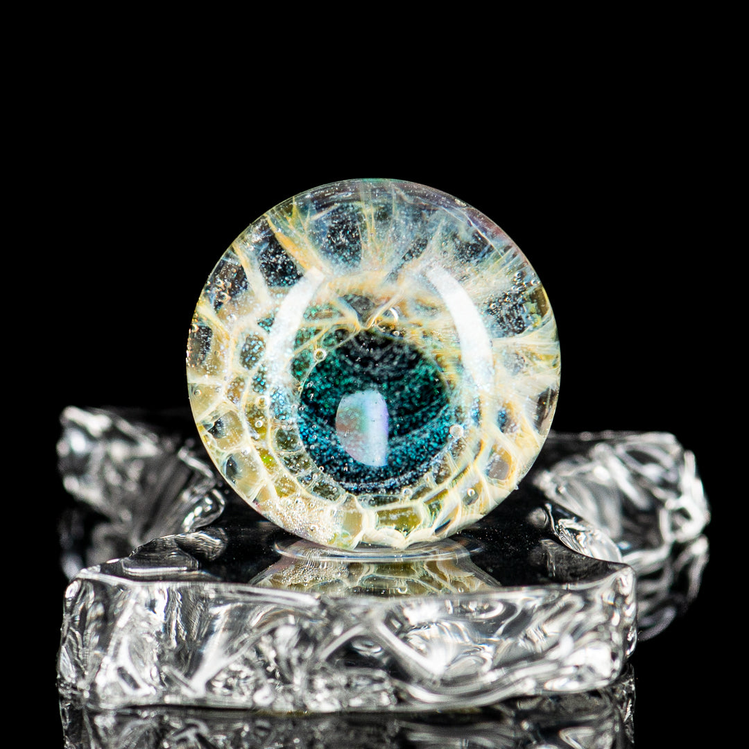 Dichropal Eye Mib Indo Glass heady glass with colorful marble accents, showcasing intricate glasswork and vibrant design details.