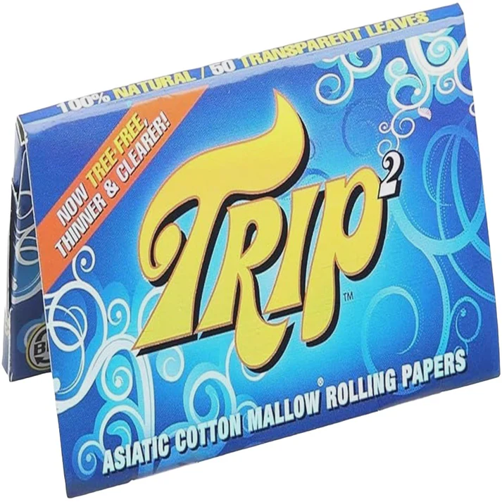 Mini clear rolling papers by Trip2, 1 1/4 size, designed for smooth rolling and discreet use, shown in the image.