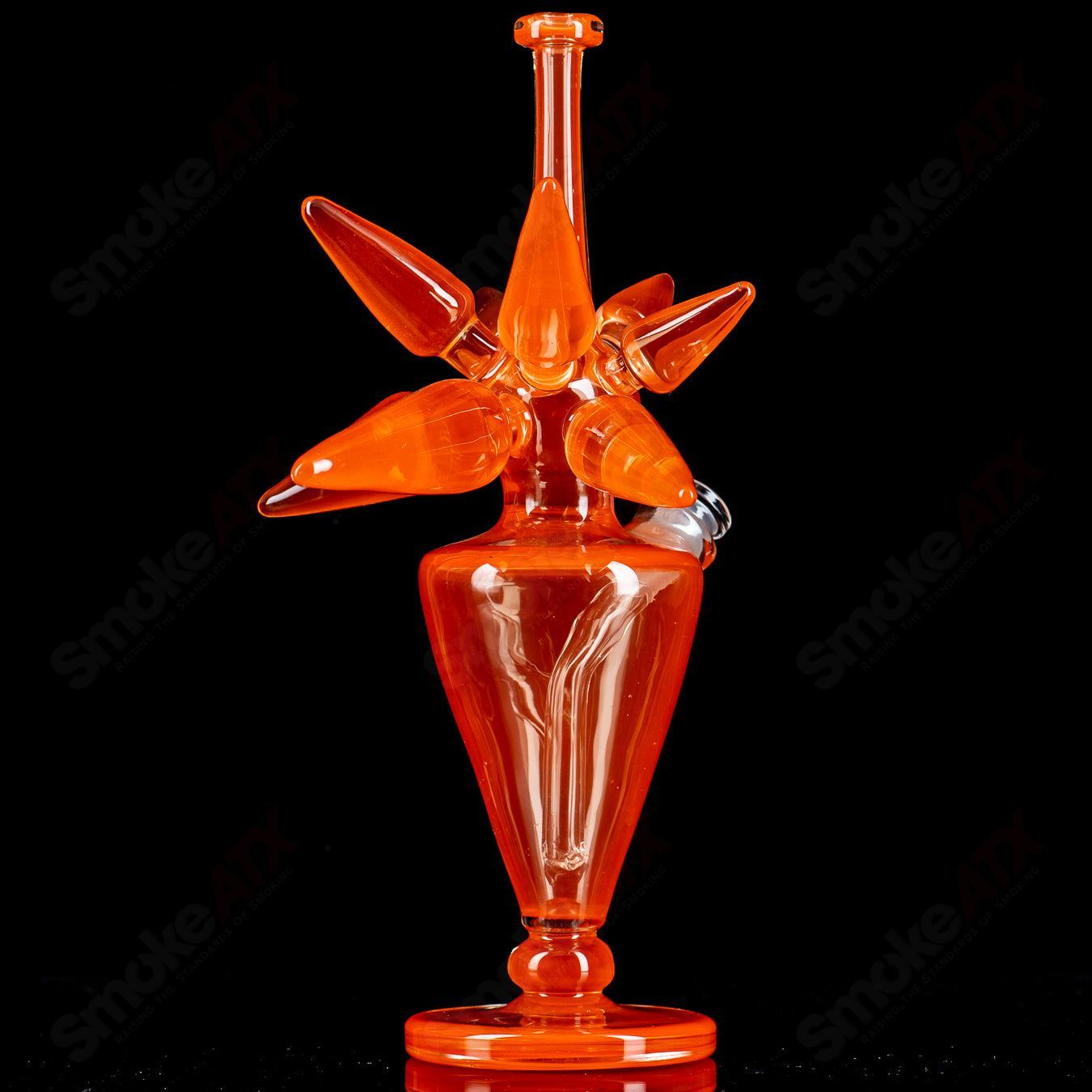 JMass OJ Spike Bottle Rig Heady Glass concentrate rig with a clear glass bottle design and intricate spike details.