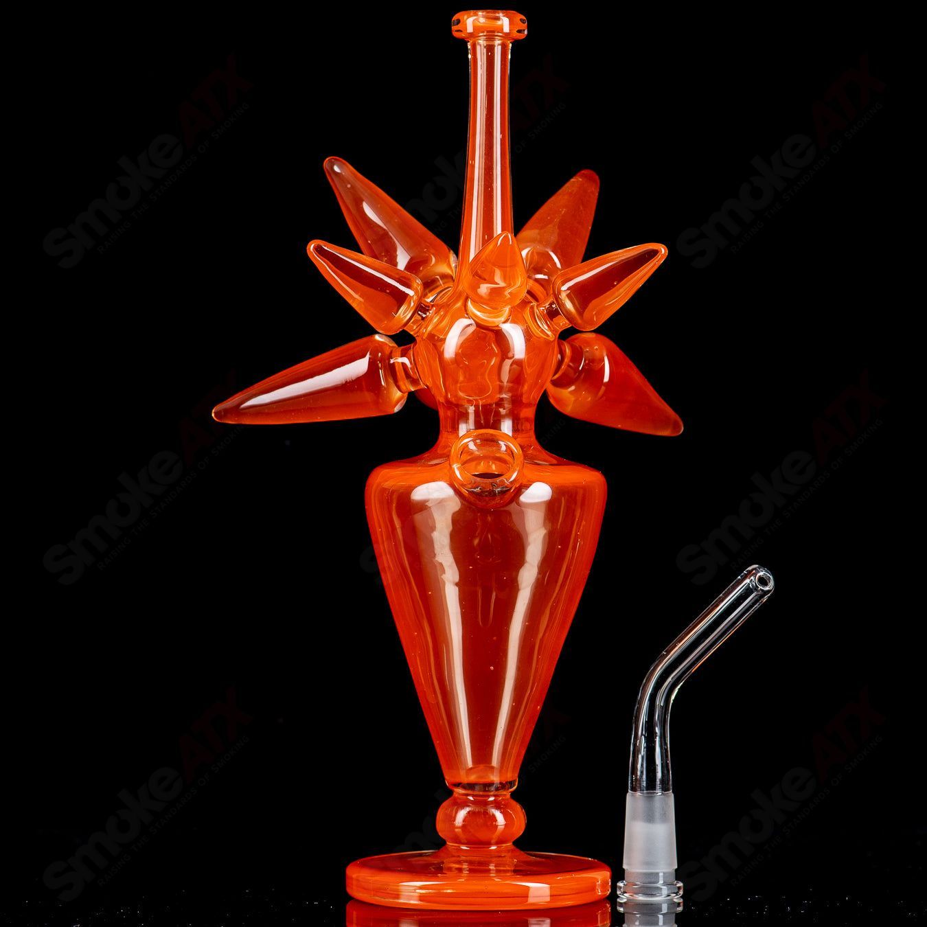 JMass OJ Spike Bottle Rig, a heady glass concentrate rig with a unique spike design, ideal for dabbing and concentrates.