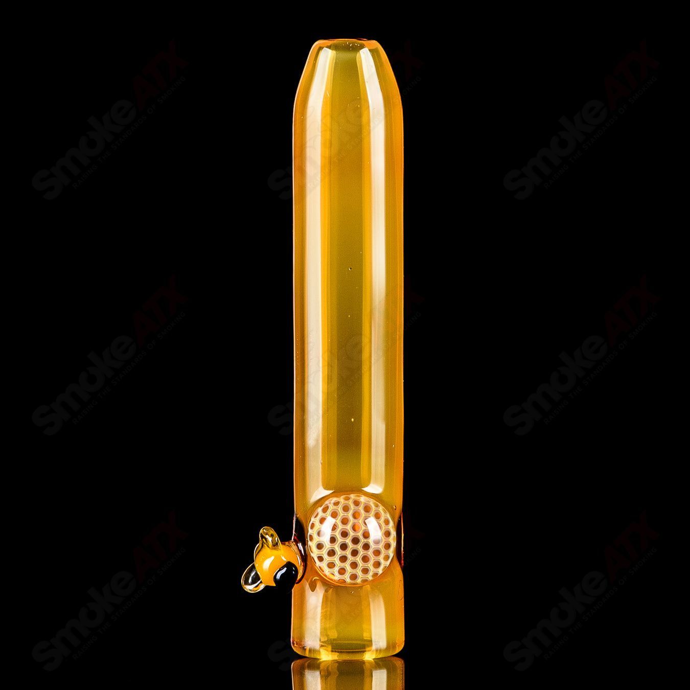 Joe P Glass honeycomb and bee chillum, colorful heady glass one-hitter pipe with intricate honeycomb and bee design.