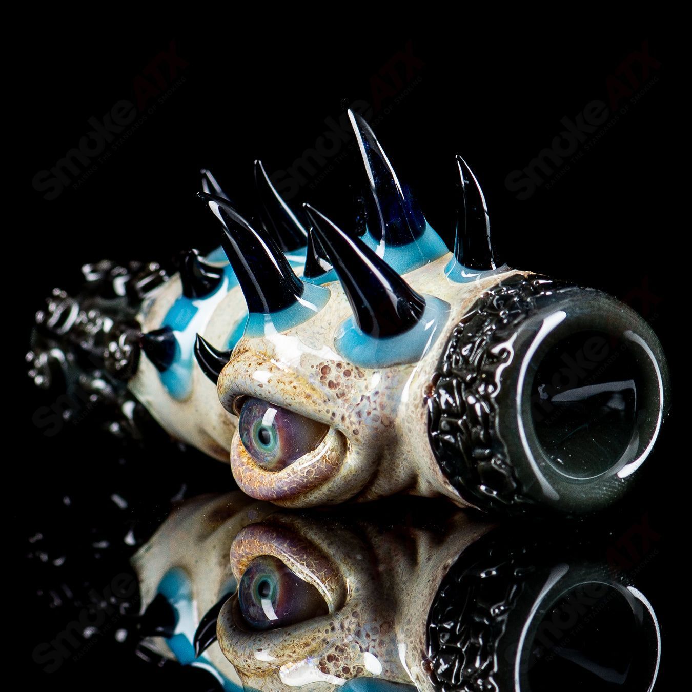 Signed 2014 Salt Glass Heady Chillum named Onie, featuring intricate glasswork and vibrant colors.