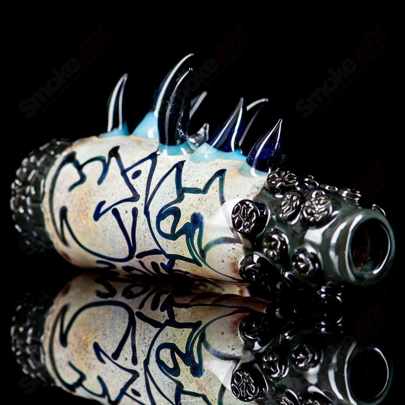 Signed 2014 Salt Glass Heady Glass Chillum named Onie, featuring intricate glasswork and vibrant colors.