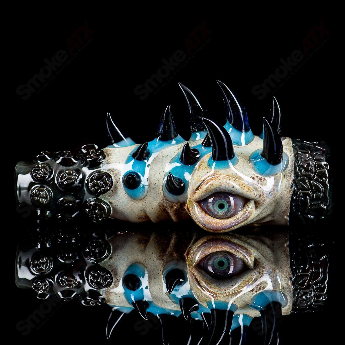 Signed 2014 Salt Glass Onie heady chillum with intricate glasswork, showcasing vibrant colors and detailed craftsmanship.
