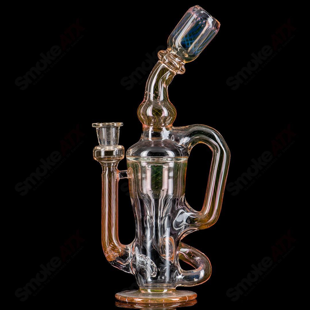 Redycler MT heady glass concentrate rig with intricate design and vibrant red accents, featuring a sturdy base and mouthpiece.