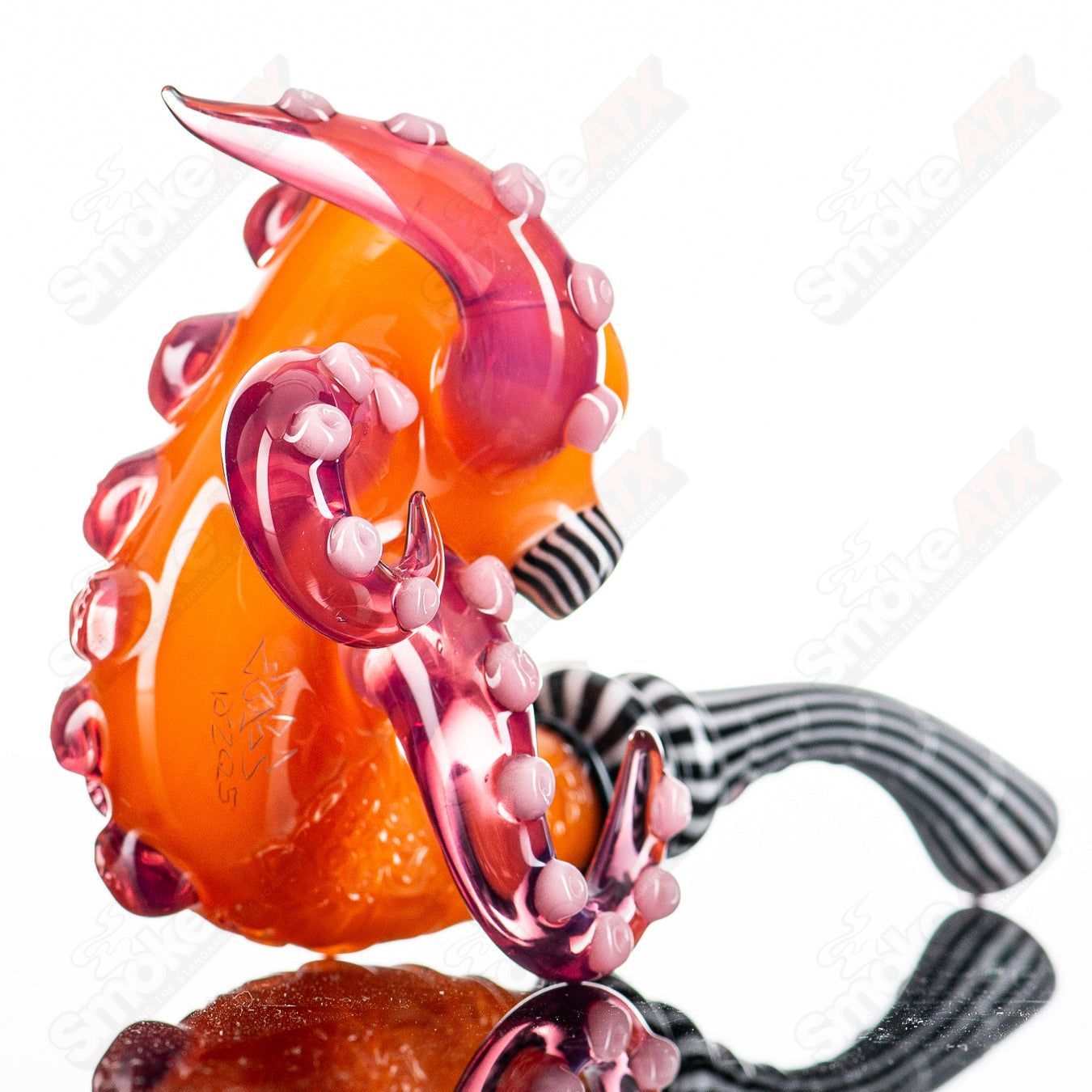 Orange Sherlock Glass with black and white line patterns and telemagenta accents, designed by JMASS X SALT for Salt Glass.
