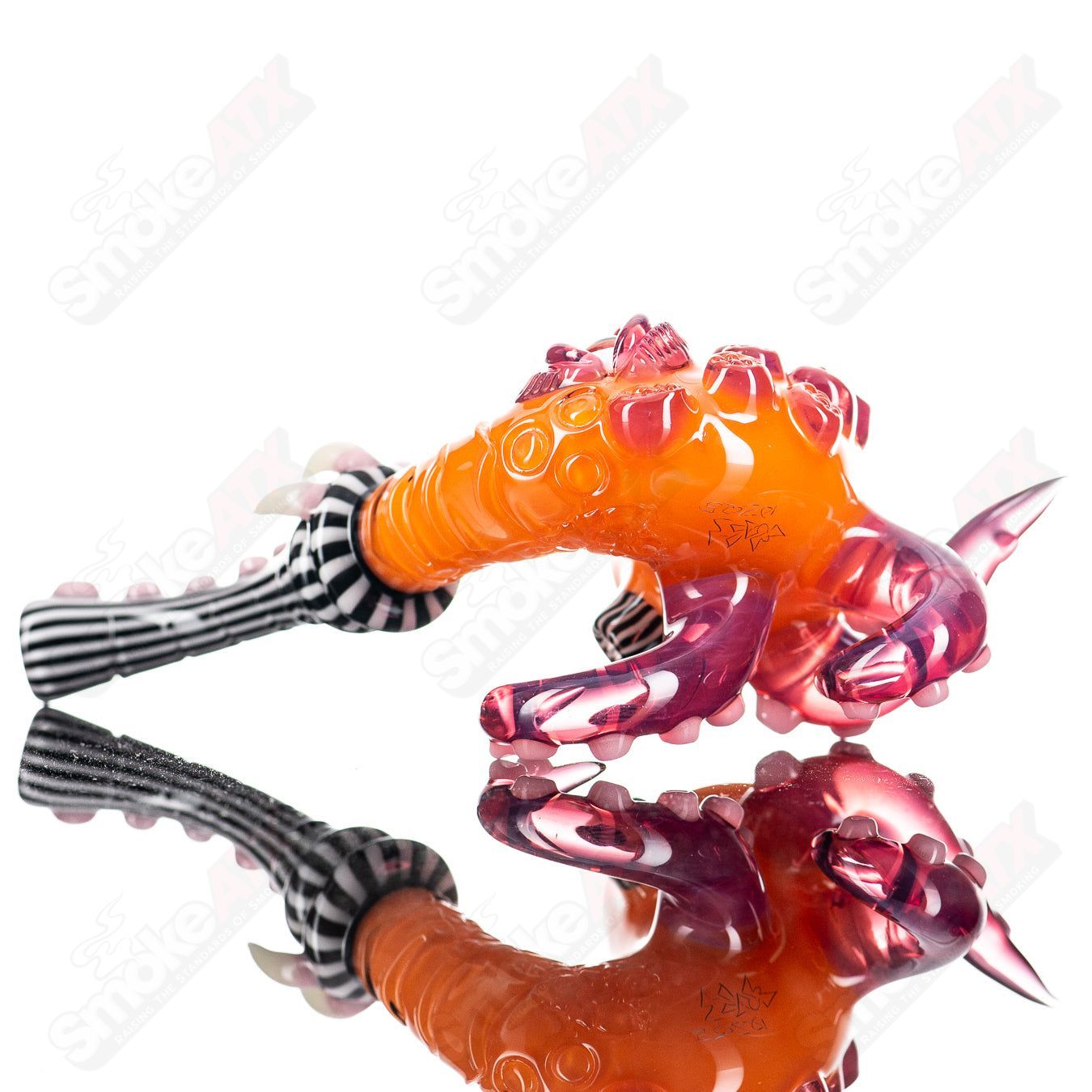 Orange Crayon Sherlock heady glass with black and white lines and telemagenta accents by Salt Glass.