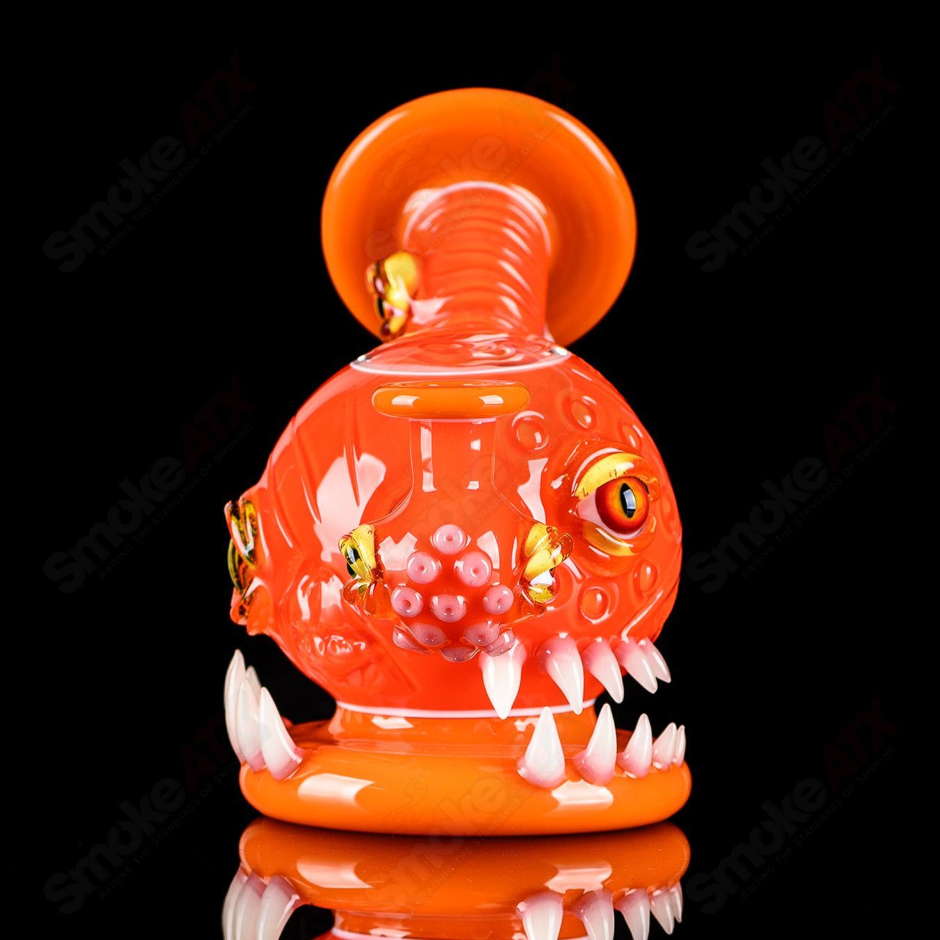 Orange Crayon Orb Rig by Salt & JAG, a colorful heady glass concentrate rig with an orb design and vibrant orange accents.