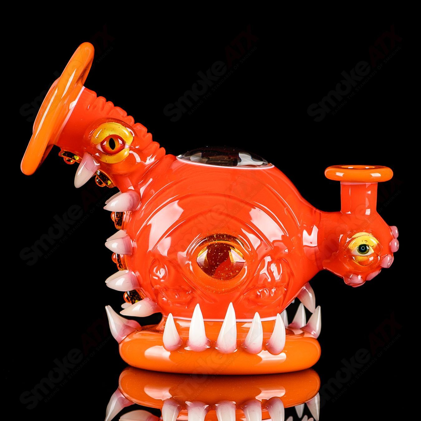 Orange Crayon Orb Rig by SALT & JAG, a colorful heady glass concentrate rig with an orb design and vibrant orange accents.