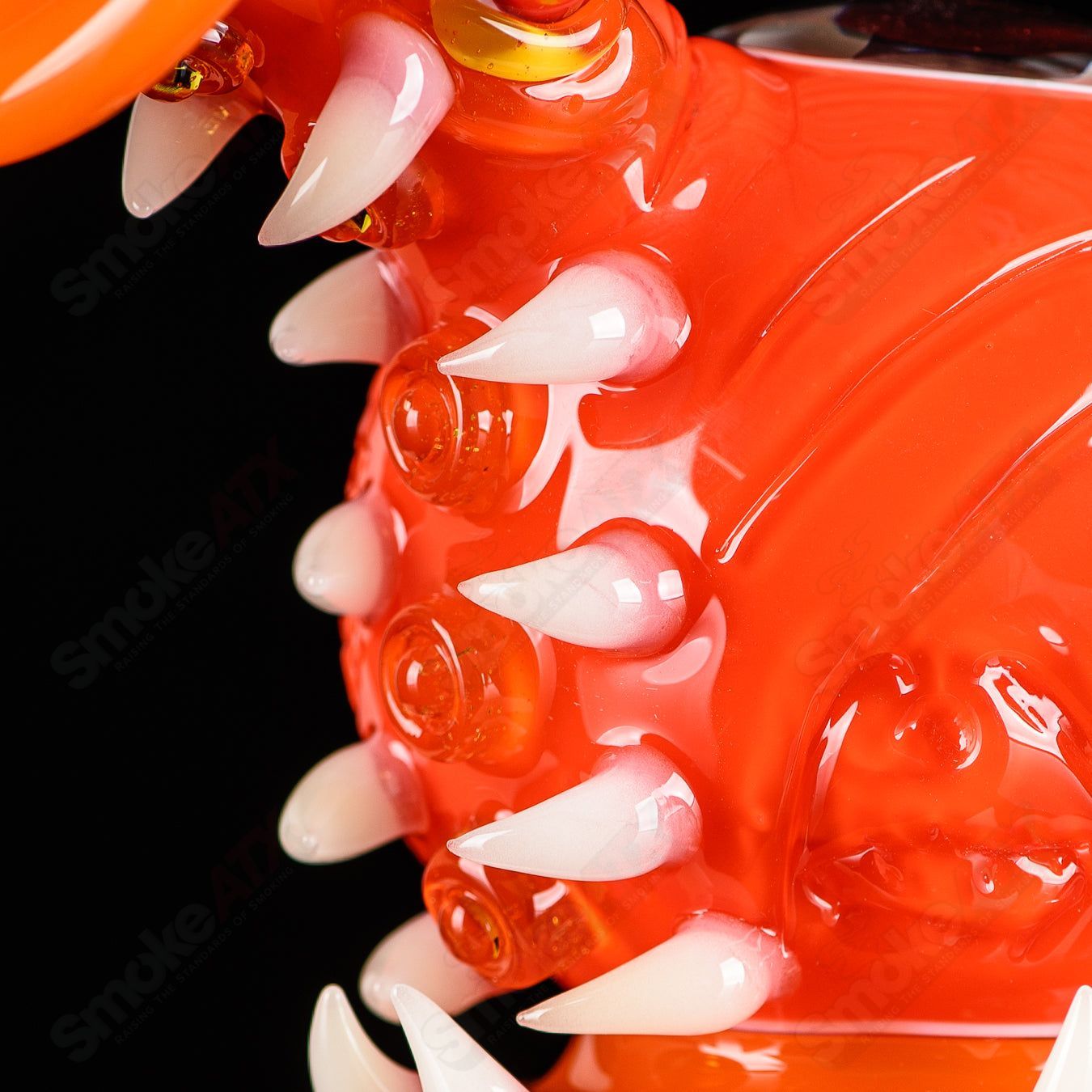 Orange Crayon Orb Rig by SALT & JAG, a colorful heady glass concentrate rig with an orb design for artistic cannabis concentrates.