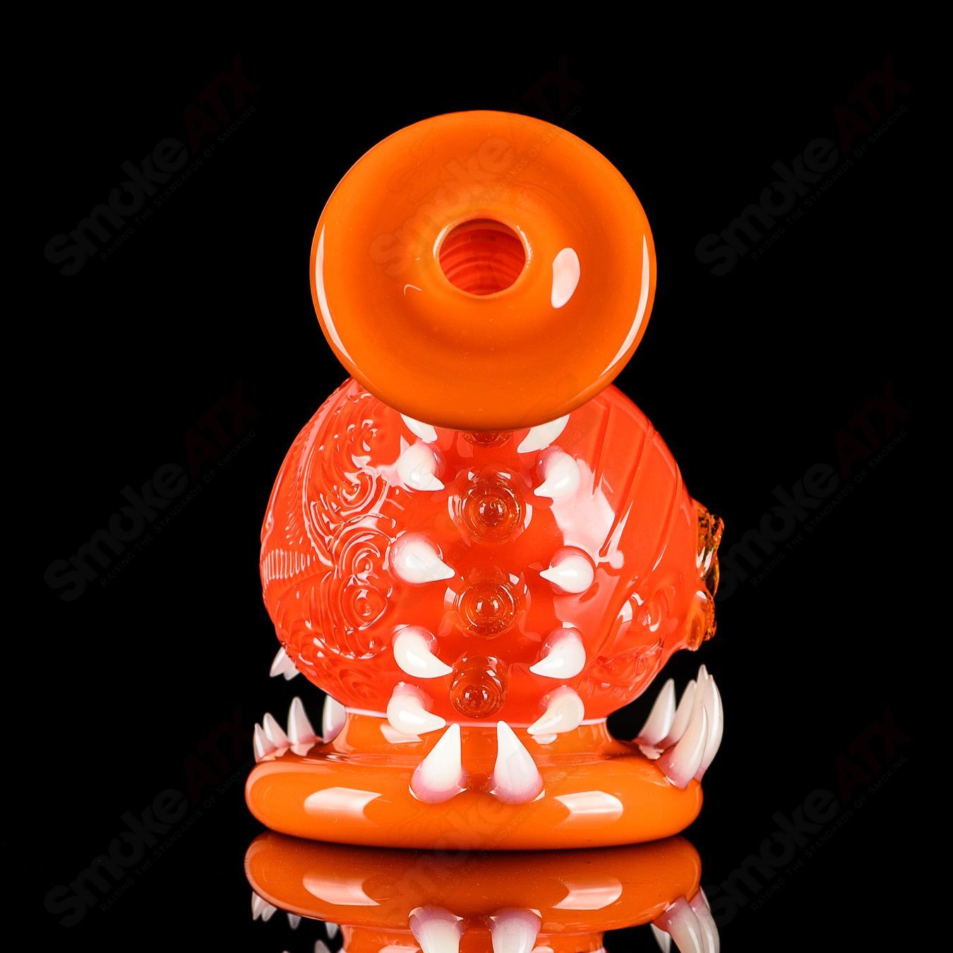 Orange Crayon Orb Rig by SALT & JAG, a colorful heady glass concentrate rig with a spherical design and vibrant orange accents.