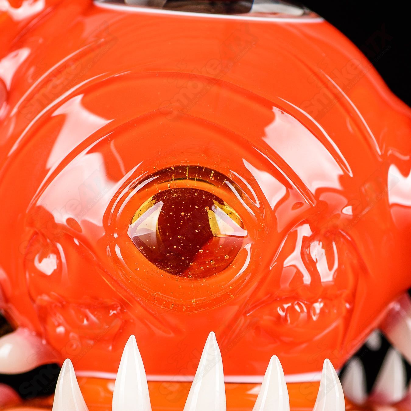 Orange Crayon Orb Rig by SALT & JAG, a colorful heady glass concentrate rig with an orange crayon-inspired design.