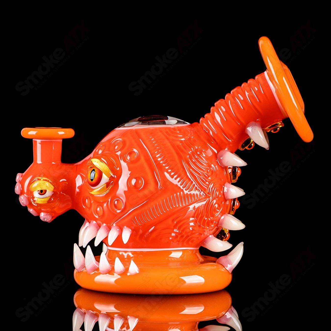 Orange Crayon Orb Rig by Salt & JAG, a colorful heady glass concentrate rig with orange and clear glass design.