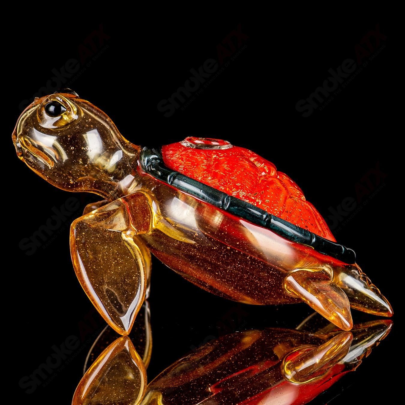 Orange dichro Honu sea turtle rig by Turtle Time, handcrafted glass concentrate rig featuring vibrant orange hues and turtle design.