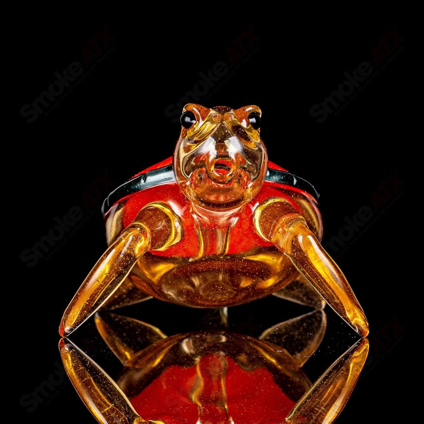 Orange Dichro Honu sea turtle rig by Turtle Time, a colorful glass concentrate rig featuring a detailed turtle design.