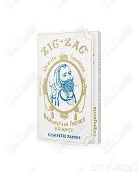 Original Zig Zag White Rolling Papers for smoking, featuring the classic zigzag branding and thin paper design.